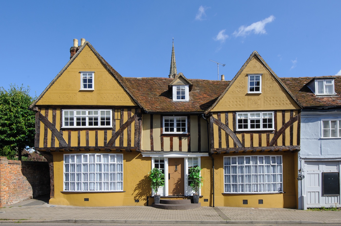 The brick exterior of a large period house in the group's portfolio